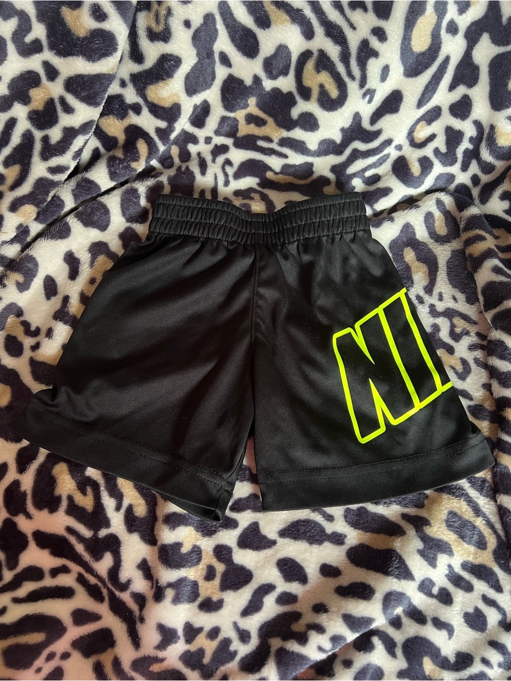 Nike Black Shorts with Neon Yellow-Green Logo